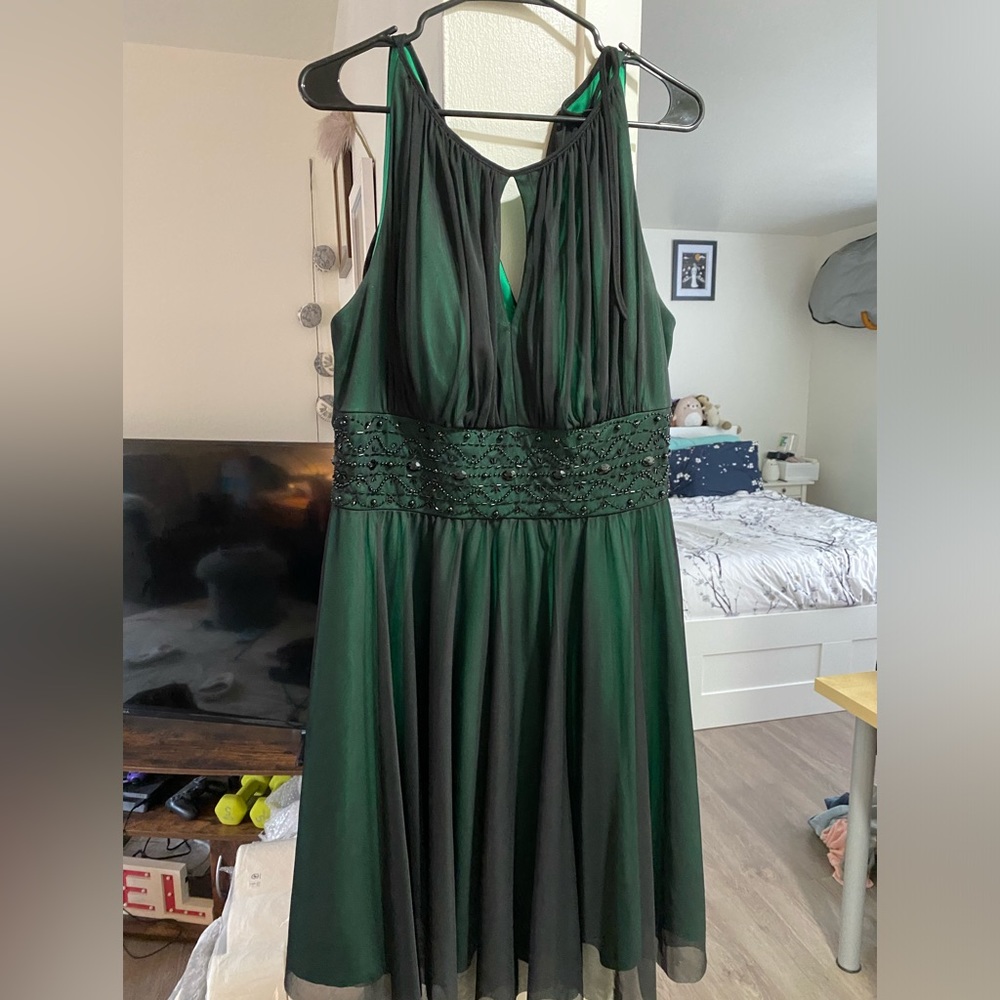 Black and green dress with beadwork